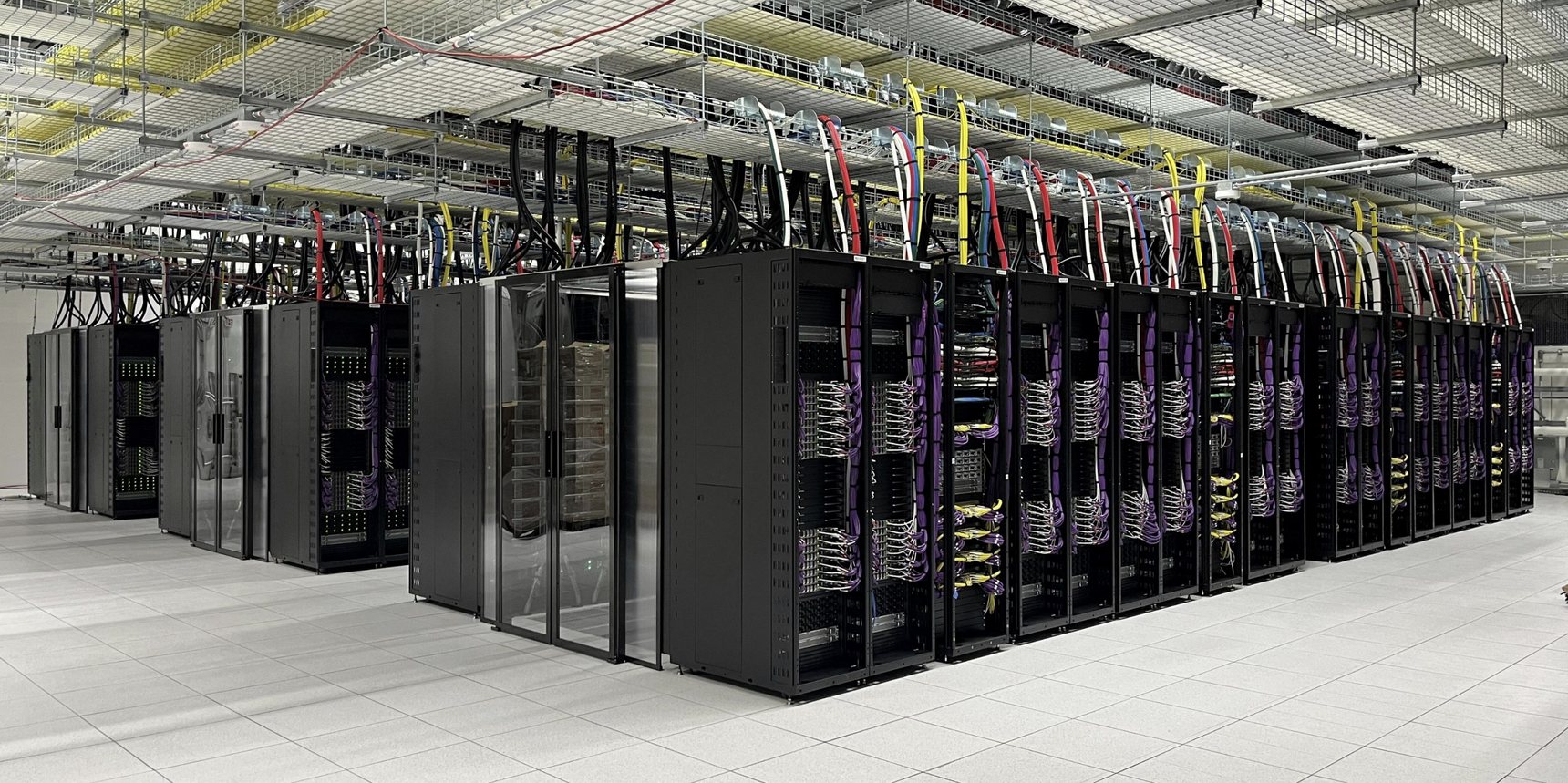Machine hall of a Tesla compute cluster in Texas